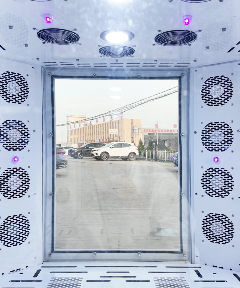Interior of a Drezen wash cabin with the ozone mist system spraying an ultra-fine mist